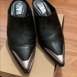 Pointed leather mules with metal detail